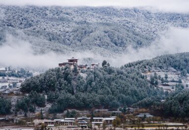 Jakar Dzong in Bumthang with view of beautiful valley.