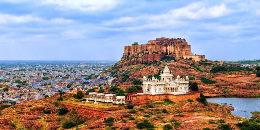 Panorama view of the blue city of Jodhpur, Rajasthan, India, with Mehrangharh Fort and Jaswant Thada mausoleum