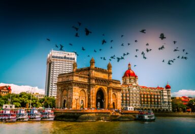 Mumbai: A dynamic blend of skyscrapers and colonial architecture, bustling markets and serene seafronts, where Bollywood meets tradition in a vibrant tapestry of culture and commerce.