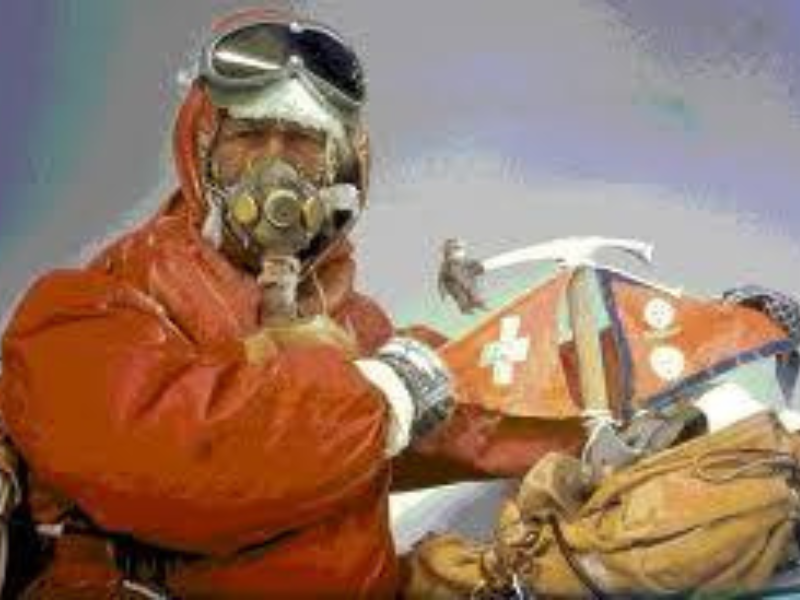 Swiss climber wearing oxygen mask and cold-weather gear during the 1956 first ascent of Lhotse by Fritz Luchsinger and Ernst Reiss.