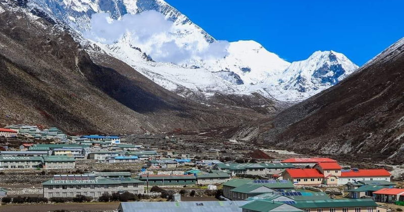 Dingboche village in the Everest region with teahouses and lodges set beneath snow-capped Himalayan peaks on the Everest Base Camp trek.