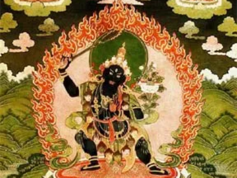 Thangka painting of Black Manjushri (Jampel Nagpo), a wrathful dark-blue form of the Bodhisattva of Wisdom, holding a flaming sword within a halo of fire. Sakya Monastery tradition.