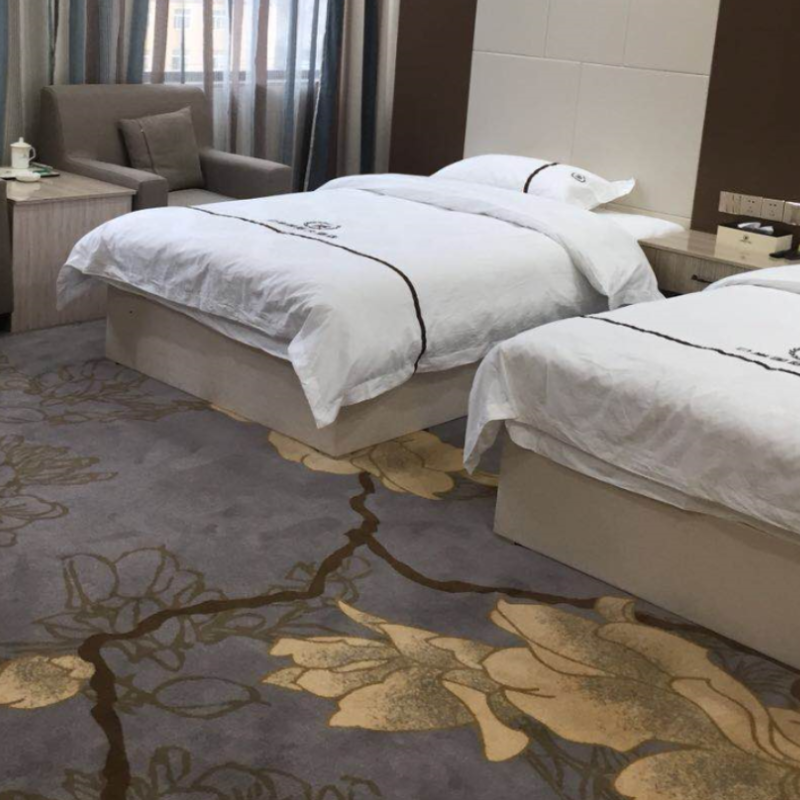 Modern twin-bed room at Port Business Hotel in Kerung near the Tibet border.