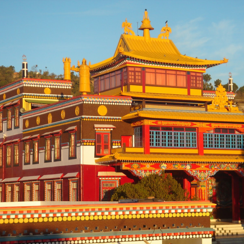 Menri Monastery with golden roof and colorful Tibetan Buddhist architecture