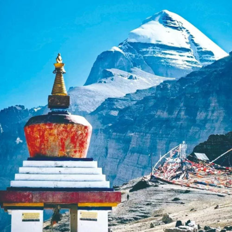 Yama Dwar stupa with Mount Kailash rising in the background on the sacred pilgrimage route.